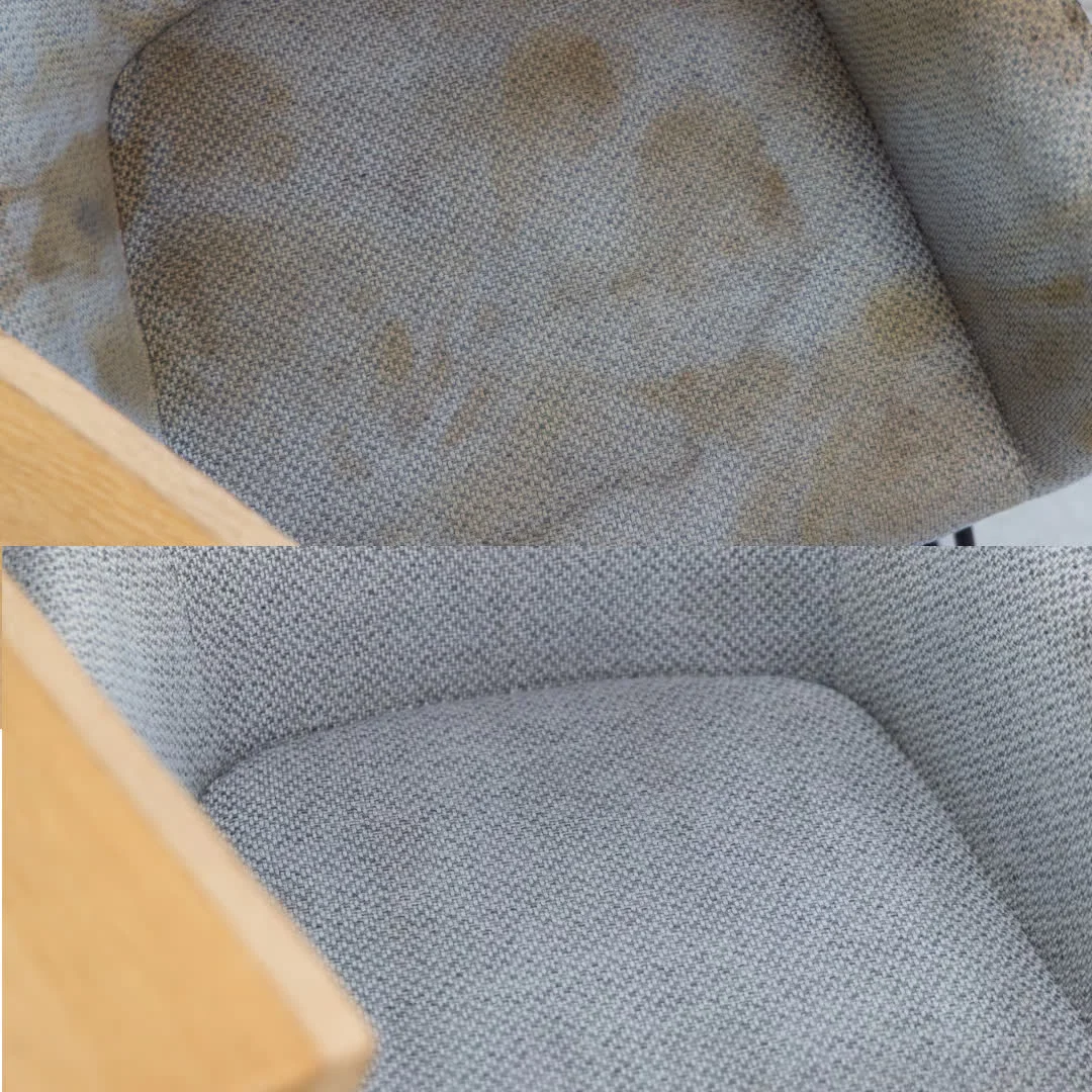 Eetkamer met stoffen stoelen rond een houten tafel